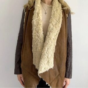 brown Afghan coat with cream wool lining and leather sleeves